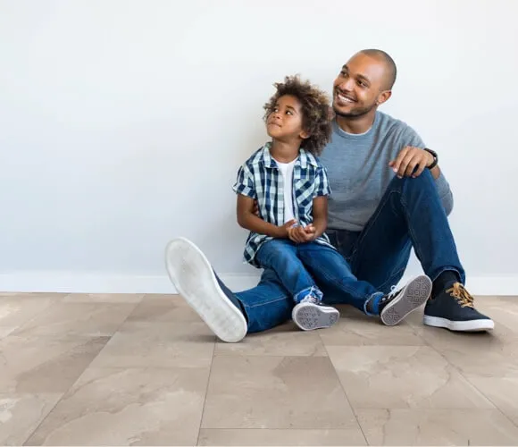 Dad son sitting on vinyl floor | My Floor Hub